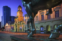 Close-up of the equestrian statue of Pedro de Valdivia  founder of the city  in Plaza de Armas. The Palacio de la Real Audiencia  home to the National History Museum is in the background.South Americ...