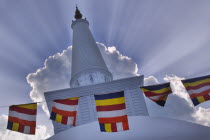 Prayer flags hanging in front of Ruvanvelisaya Dagoba.worshipprayerBuddhismBuddhaAsiaSri LankatravelshrinefaithAsian Llankai Sri Lankan