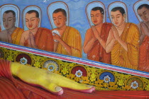 Detail of the reclining Buddha in Isurumuniya Vihara  Rock Temple .Sri LankatravelAsiaBuddhashrineBuddhismworshipprayerfaithAsian Llankai Sri Lankan