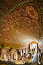 School children entering Sri Dalada Maligawa  Temple of the Tooth .BuddhismshrineBuddhaKandyAsiatravelSri Lankapatternfish-eyefaithAsian Kids Llankai Sri Lankan