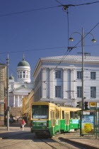 City centre tram with the Tuomiokirkko  Lutheran Cathedral  in the background.traveltransportcapitalScandinaviaHelsinkiFinland Aland Baltic Center Nordic Northern Europe Suomi