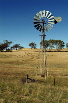 Wind powered water pump outside Perth.Water  Agriculture Antipodean Aussie Australian Oceania Oz