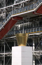 The gilded sculpture Le Pot Dore by Jean-Pierre Raynaud in the Place Georges Pompidou in front of the Pompidou Centre in Beauborg Les HallesFrench Western Europe European