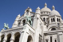 Montmartre The facade of the church of Sacre Couer with the bronze equestrian statues of Saint Louis and Joan of Arc by H LevebureFrench Western Europe European