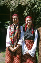 Two girls dressed in Bulgarian national costume.TravelTourismHolidayVacationAdventureExploreRecreationLeisureSightseeingTouristAttractionTourChalinValogBanskoBulgariaBulgarianSummer...