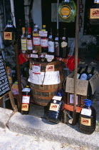 Display of wine bottles  barrel  and containers outside shop.Store TravelTourismHolidayVacationAdventureExploreRecreationLeisureSightseeingTouristAttractionTourMelnikBulgariaBulgarianS...