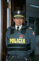 Policeman in uniform wearing bullet proof clothing.Cuzco TravelTourismHolidayVacationExploreRecreationLeisureSightseeingTouristAttractionTourDestinationCuscoCuzcoPeruPeruvianSouthSo...