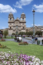 Looking across Plaza de Armas to Iglesia La Compania de Jesus.Cuzco TravelTourismHolidayVacationExploreRecreationLeisureSightseeingTouristAttractionTourDestinationPlazaDeArmasCuscoCuz...