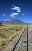 Railway track through the Andes mountain range  Puno to Cusco Perurail train journey.Cuzco TravelTourismHolidayVacationExploreRecreationLeisureSightseeingTouristAttractionTourDestinationP...
