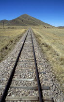 Railway track through the Andes mountain range  Puno to Cusco Perurail train journey.Cuzco TravelTourismHolidayVacationExploreRecreationLeisureSightseeingTouristAttractionTourDestinationP...