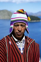 Sun Island. Man wearing hat  Inti Wata Cultural Complex.TravelTourismHolidayVacationExploreRecreationLeisureSightseeingTouristAttractionTourDestinationSunIslandLakeLagoTiticacaCopaca...