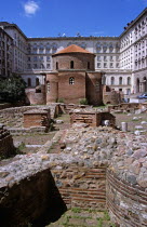 Church of Saint George  Rotunda of St George TravelTourismHolidayVacationExploreRecreationLeisureSightseeingTouristAttractionTourStSaintGeorgeSvetiGeorgiChurchChurchesReligionReligiousChristianityOrthodoxHolyDivineChristianTheologyPrayPrayerWorshipWorshippingWorshipingFaithSofiaCapitalCityBulgariaBulgarianEastEasternEuropeEuropeanCalendarVividVibrantSummerBrightSunnySunDomeMagnificentLandmarkBuildingArchitectureArchitecturalTranquilityTranquilCalmPeacefulHistoryHistoricHistoricalFaadeSymmetrySymmetricalRotundaRomanOldNewAncientModernNationalBrickBrickworkRemainsRelicsRoundRotundOldestPreservePreservedSixthCenturyStoneExcavateExcavationFoundationsFoundationBlueSkyEastern Europe