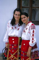 Two girls in national costume.TravelTourismHolidayVacationAdventureExploreRecreationLeisureSightseeingTouristAttractionTourVelikoTarnovoTurnovoBulgariaBulgarianEastEasternEuropeE...