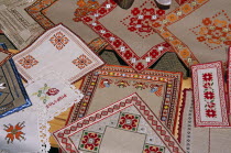 Colourful Bulgarian embroidery outside gift shop.Colorful Store TravelTourismHolidayVacationAdventureExploreRecreationLeisureSightseeingTouristAttractionTourVelikoTarnovoTurnovoBulgariaBulgarianEastEasternEuropeEuropeanCalendarTraditionTraditionalEthnicPatternPatternedVividVibrantCultureCulturalEmbroideryEmbroideredSewingSewnSewShopShoppingStoreSellSellingSouvenirGiftPresentDetailDetailedStitchStitchesCrossStitchingDisplayArrangementCraftCountryNameBusinessRandomSquareRectangleShapeAngleThreadLinenSouvenirServietteServiettesDecorationDecorateDecorativeFabricClothMaterialEastern Europe