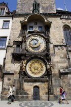 Old Town. People walking past the Astronomical clock on the tower of The Old Town HallPraha Ceska Eastern Europe European