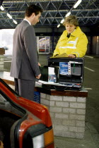 Man going through Customs CheckCustoms and Excise Great Britain UK United Kingdom British Isles European Northern Europe