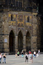 Tourists outside the Golden Portal of St Vituss Cathedral withn Prague CastlePraha Ceska Eastern Europe European Religion