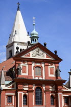 The facade of the Romanesque St Georges Basilica in Prague Castle in HradcanyPraha Ceska Eastern Europe European Religion