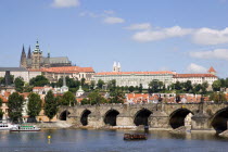 The Charles Bridge across the Vltava River leading to the Little Quarter with Prague Castle and St Vituss cathedral beyond in HradcanyPraha Ceska Eastern Europe European Religion