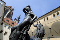 Sculptures of two figures in a small sqaure behind the Church of Our Lady before Tyn in The Old TownPraha Ceska Eastern Europe European Religion
