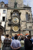 Tourists waiting for the hourly allegorical show on the Astronomical Clock on the Old Town in the Old Town SquarePraha Ceska Eastern Europe European
