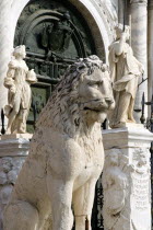 A pillaged Greek statue of a seated lion at the entrance to the Arsenal