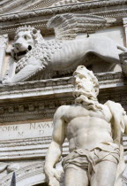 A stone carving of the winged Lion of St Mark at the entrance to the Arsenal