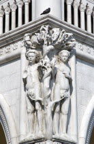 Carving of Adam and Eve with the Serpent on the corner of the Doges Palace in the Piazzetta