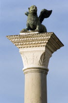 The Column of San Marco topped with the winged Lion of Venice in the Piazzetta