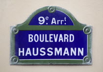 Street sign for Boulevard Haussmann on a wall in the Nineth ArrondissmentEuropean French Western Europe
