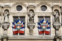 French Tricolour flags displayed in a windows of the Hotel de Ville or Town HallEuropean Western Europe