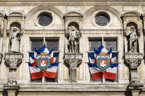 French Tricolour flags displayed in a windows of the Hotel de Ville or Town HallEuropean Western Europe