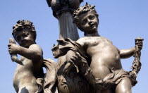 Bronze cherubs on an ornate lamppost on the Pont Alexandre III bridgeEuropean French Western Europe