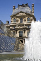 The centrepiece of the Richelieu wing of the Musee du Louvre with the Pyramid entrance and fountain in the foregroundEuropean French Western Europe