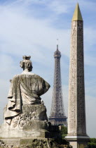 A statue and the Obelisk in Place de la Concorde with the Eiffel Tower in the distanceEuropean French Western Europe