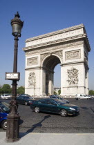 Busy traffic around the Arc de Triomphe in Place Charles de GaulleEuropean French Western Europe