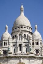 Montmartre The Facade of the church of Sacre Couer with tourists by the ballistrade at the front looking over ParisEuropean French Religion Western Europe