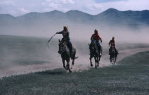 Boy jockeys and horses taking part in National Day 50km horse race.