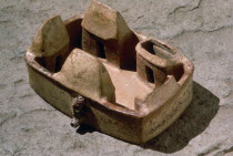 Inca period ceramic representation of farmers compound.