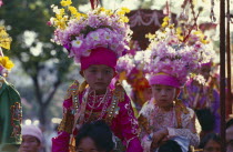Two Luk Kaew or Crystal Children in costume carried on shoulders of adults to Shan ordination ritual at Wat Pa Pao.monk Asian Kids Prathet Thai Raja Anachakra Thai Religion Siam Southeast Asia Religi...