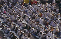 Rows of Muslims kneeling in prayer.Dacca Asia Asian Bangladeshi Religion Religious Dacca Asia Asian Bangladeshi Religion Religious