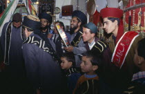 Sufi dancers and musicians in a mosque