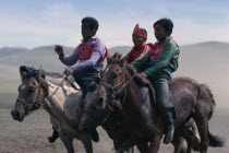National Day horse race with boy jockeys on horsebackAsia Asian Equestrian Kids Mongol Uls Mongolian  Asia Asian Equestrian Kids Mongol Uls Mongolian