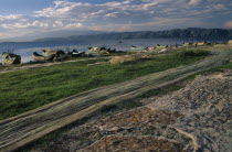 Drying nets and fishing boats beside Er Hai Lake.Asia Asian Chinese Chungkuo Jhonggu Zhonggu  Asia Asian Chinese Chungkuo Jhonggu Zhonggu