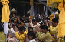 Kuningan Festival. Mas women dressed in yellow at Pura Taman Pule Temple  decorated in yellow  Asian Southeast Asia  Asian Southeast Asia
