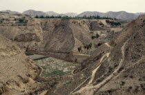 Loess eroded valleys and terracing for crops.