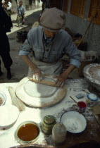 Man making moon cakes.