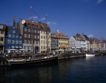 Nyhavn harbour. Traditional waterfront buildings with moored boats Danish Danmark Northern Europe  Scandinavia