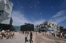 Federation Square.  Public civic centre and meeting place  modern architecture and crowds of people.Antipodean Aussie Australian Center Oceania Oz