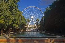 The Wheel of Seville  Prado de San Sebastian.TravelTourismHolidayVacationExploreRecreationLeisureSightseeingTouristAttractionTourDestinationTripJourneyFerrisWheelOfSevilleSevillaAn...
